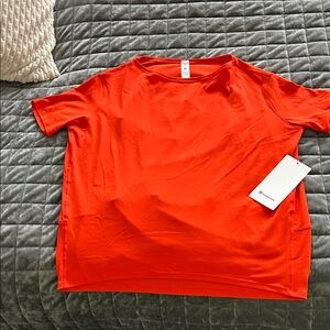 Lululemon Athletica Bold Orange Apparel back in action NULU NWT